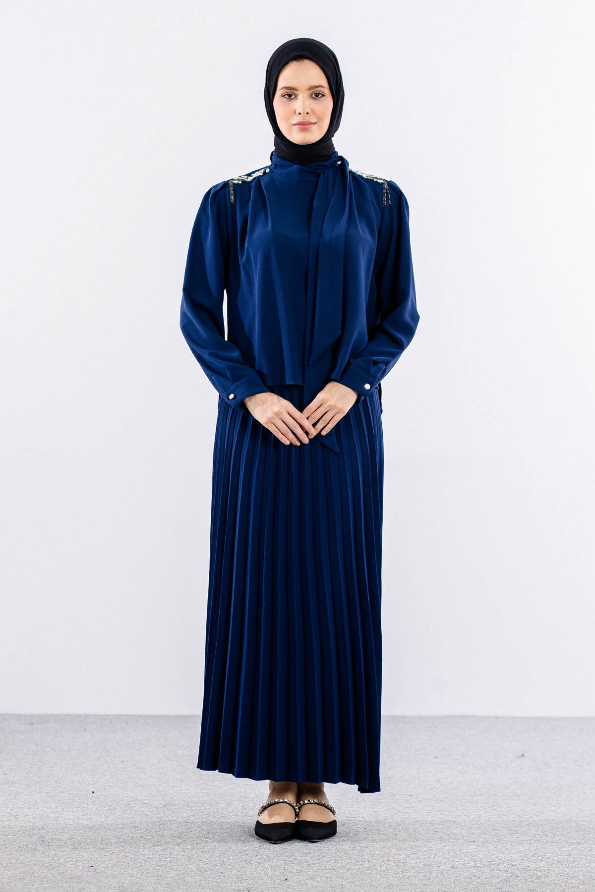 7711 E. Takım 40-48 Pilise Etek - Saks